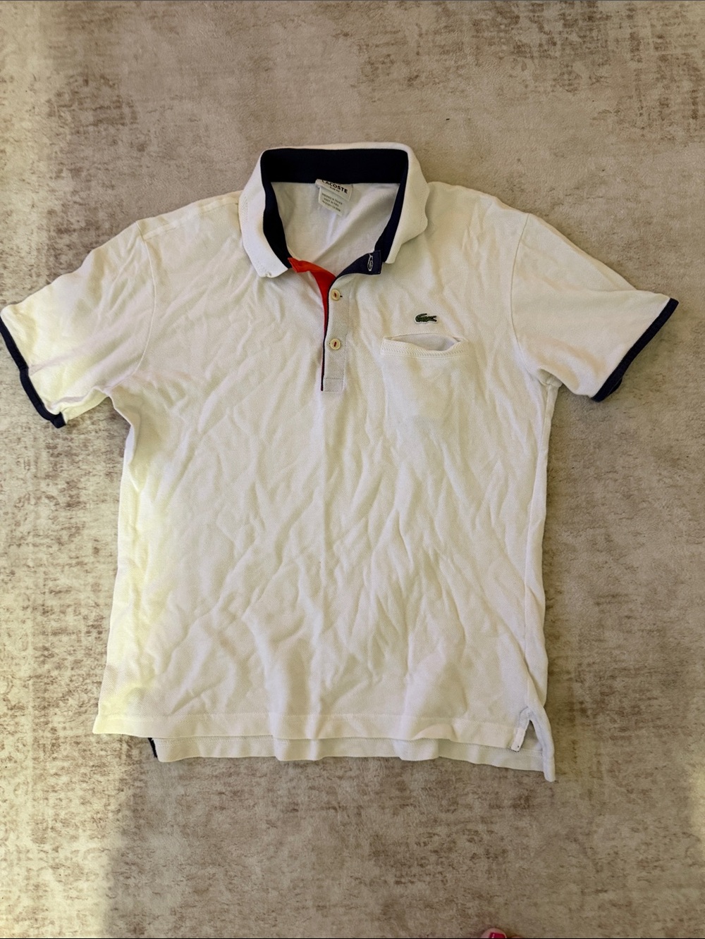 Lacoste White Polo with Navy Trim and Red Placket Accent